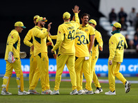 Mitchell Starc of Australia and teammates celebrate the wicket of Phil Salt of England during the Metro Bank One Day Series match between En...