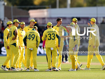 Mitchell Starc of Australia and teammates celebrate after taking the wicket of Ben Duckett of England during the Metro Bank One Day Series m...