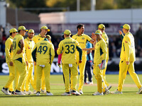 Mitchell Starc of Australia and teammates celebrate after taking the wicket of Ben Duckett of England during the Metro Bank One Day Series m...