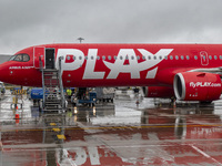 PLAY airline Airbus A321neo passenger aircraft spotted parked in front of the airport terminal building and the air bridge on the tarmac of...