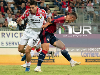 Roberto Piccoli (#91 Cagliari Calcio) and Lochoshvili (US Cremonese) during the Italy Cup Frecciarossa match between Cagliari Calcio and US...