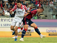 Roberto Piccoli (#91 Cagliari Calcio) and Lochoshvili (US Cremonese) during the Italy Cup Frecciarossa match between Cagliari Calcio and US...