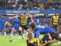 Curtis Stokes (14 Barrow) controls the ball during the Carabao Cup Third Round match between Chelsea and Barrow at Stamford Bridge in London...