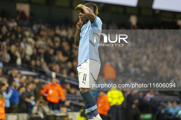 Jeremy Doku #11 of Manchester City F.C. celebrates his goal during the Carabao Cup Third Round match between Manchester City and Watford at...