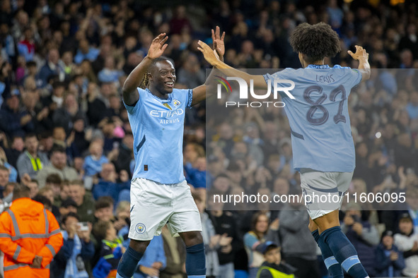 Jeremy Doku #11 of Manchester City F.C. celebrates his goal during the Carabao Cup Third Round match between Manchester City and Watford at...