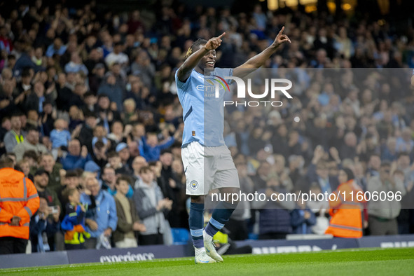 Jeremy Doku #11 of Manchester City F.C. celebrates his goal during the Carabao Cup Third Round match between Manchester City and Watford at...