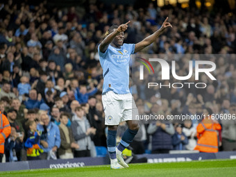 Jeremy Doku #11 of Manchester City F.C. celebrates his goal during the Carabao Cup Third Round match between Manchester City and Watford at...