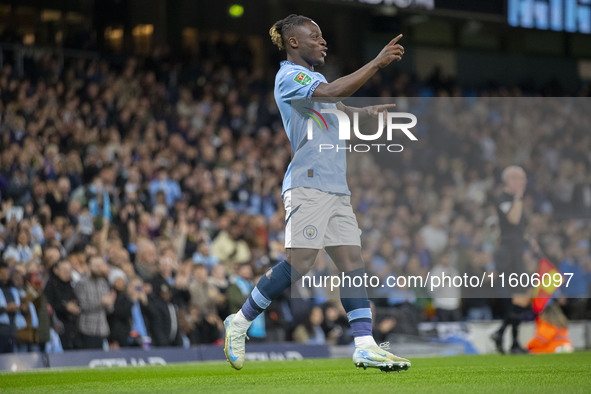 Jeremy Doku #11 of Manchester City F.C. celebrates his goal during the Carabao Cup Third Round match between Manchester City and Watford at...