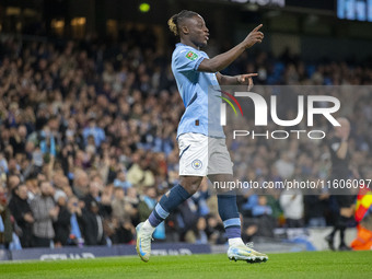 Jeremy Doku #11 of Manchester City F.C. celebrates his goal during the Carabao Cup Third Round match between Manchester City and Watford at...