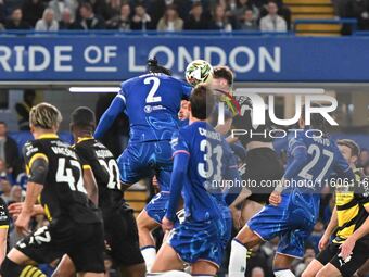 Axel Disasi (2 Chelsea) challenges Rory Feely (24 Barrow) during the Carabao Cup Third Round match between Chelsea and Barrow at Stamford Br...