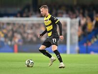 Elliot Newby (11 Barrow) controls the ball during the Carabao Cup Third Round match between Chelsea and Barrow at Stamford Bridge in London,...