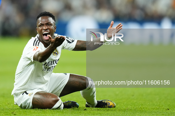 Vinicius Junior left winger of Real Madrid and Brazil protest to referee during the La Liga match between Real Madrid CF and Deportivo Alavé...