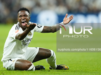 Vinicius Junior left winger of Real Madrid and Brazil protest to referee during the La Liga match between Real Madrid CF and Deportivo Alavé...