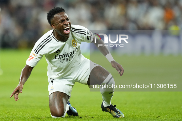 Vinicius Junior left winger of Real Madrid and Brazil protest to referee during the La Liga match between Real Madrid CF and Deportivo Alavé...