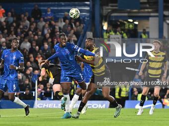 Emile Acquah (20 Barrow) challenges Axel Disasi (2 Chelsea) during the Carabao Cup Third Round match between Chelsea and Barrow at Stamford...