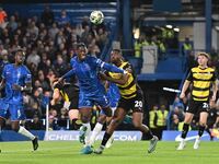 Emile Acquah (20 Barrow) challenges Axel Disasi (2 Chelsea) during the Carabao Cup Third Round match between Chelsea and Barrow at Stamford...