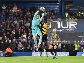 Goalkeeper Filip Jorgensen (12 Chelsea) is challenged by Emile Acquah (20 Barrow) during the Carabao Cup Third Round match between Chelsea a...