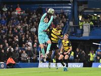 Goalkeeper Filip Jorgensen (12 Chelsea) is challenged by Emile Acquah (20 Barrow) during the Carabao Cup Third Round match between Chelsea a...