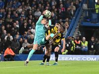 Goalkeeper Filip Jorgensen (12 Chelsea) is challenged by Emile Acquah (20 Barrow) during the Carabao Cup Third Round match between Chelsea a...