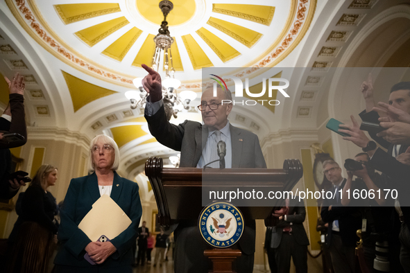 Senate Majority Leader Chuck Schumer (D-NY) calls on a reporter for a question during Senate Democrats' weekly press conference in Washingto...