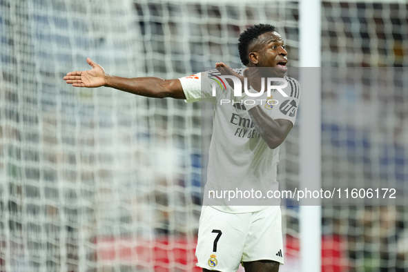 Vinicius Junior left winger of Real Madrid and Brazil protest to referee during the La Liga match between Real Madrid CF and Deportivo Alavé...