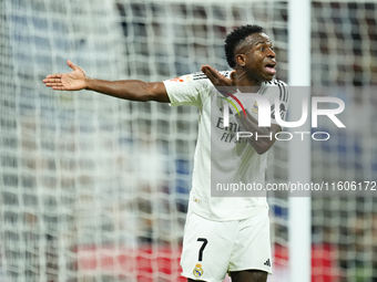 Vinicius Junior left winger of Real Madrid and Brazil protest to referee during the La Liga match between Real Madrid CF and Deportivo Alavé...