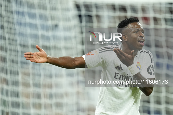 Vinicius Junior left winger of Real Madrid and Brazil protest to referee during the La Liga match between Real Madrid CF and Deportivo Alavé...