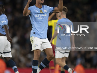 Matheus Nunes #27 of Manchester City F.C. celebrates his goal during the Carabao Cup Third Round match between Manchester City and Watford a...