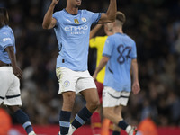 Matheus Nunes #27 of Manchester City F.C. celebrates his goal during the Carabao Cup Third Round match between Manchester City and Watford a...