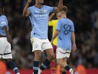 Matheus Nunes #27 of Manchester City F.C. celebrates his goal during the Carabao Cup Third Round match between Manchester City and Watford a...