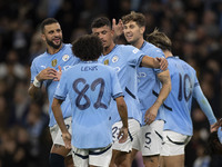 Matheus Nunes #27 of Manchester City F.C. celebrates his goal with teammates during the Carabao Cup Third Round match between Manchester Cit...