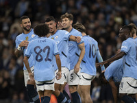 Matheus Nunes #27 of Manchester City F.C. celebrates his goal with teammates during the Carabao Cup Third Round match between Manchester Cit...