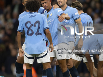 Matheus Nunes #27 of Manchester City F.C. celebrates his goal with teammates during the Carabao Cup Third Round match between Manchester Cit...