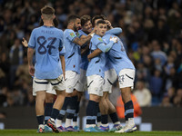 Matheus Nunes #27 of Manchester City F.C. celebrates his goal with teammates during the Carabao Cup Third Round match between Manchester Cit...