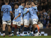 Matheus Nunes #27 of Manchester City F.C. celebrates his goal with teammates during the Carabao Cup Third Round match between Manchester Cit...