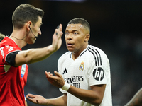 Kylian Mbappe centre-forward of Real Madrid and France protest to referee during the La Liga match between Real Madrid CF and Deportivo Alav...