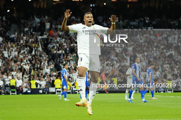 Kylian Mbappe centre-forward of Real Madrid and France celebrates after scoring his sides first goal during the La Liga match between Real M...