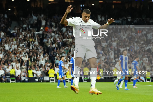 Kylian Mbappe centre-forward of Real Madrid and France celebrates after scoring his sides first goal during the La Liga match between Real M...