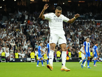 Kylian Mbappe centre-forward of Real Madrid and France celebrates after scoring his sides first goal during the La Liga match between Real M...