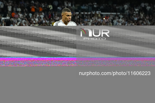 Kylian Mbappe centre-forward of Real Madrid and France celebrates after scoring his sides first goal during the La Liga match between Real M...