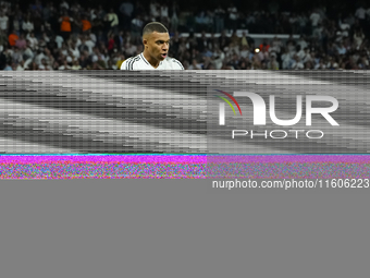 Kylian Mbappe centre-forward of Real Madrid and France celebrates after scoring his sides first goal during the La Liga match between Real M...