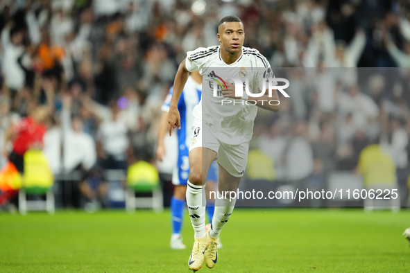 Kylian Mbappe centre-forward of Real Madrid and France celebrates after scoring his sides first goal during the La Liga match between Real M...