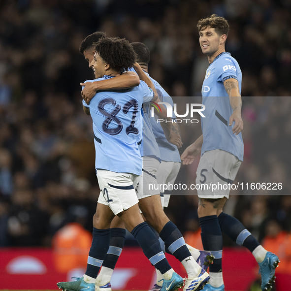 Matheus Nunes #27 of Manchester City F.C. celebrates his goal during the Carabao Cup Third Round match between Manchester City and Watford a...