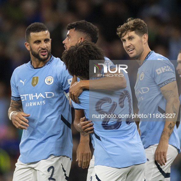 Matheus Nunes #27 of Manchester City F.C. celebrates his goal during the Carabao Cup Third Round match between Manchester City and Watford a...