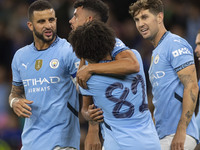 Matheus Nunes #27 of Manchester City F.C. celebrates his goal during the Carabao Cup Third Round match between Manchester City and Watford a...