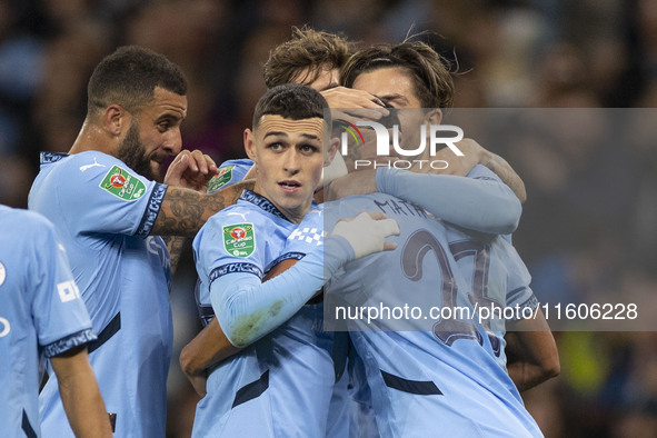 Matheus Nunes #27 of Manchester City F.C. celebrates his goal during the Carabao Cup Third Round match between Manchester City and Watford a...