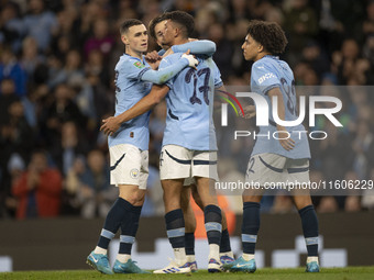 Matheus Nunes #27 of Manchester City F.C. celebrates his goal during the Carabao Cup Third Round match between Manchester City and Watford a...