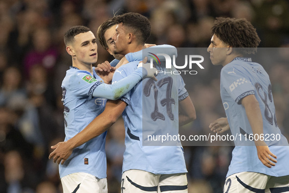 Matheus Nunes #27 of Manchester City F.C. celebrates his goal during the Carabao Cup Third Round match between Manchester City and Watford a...