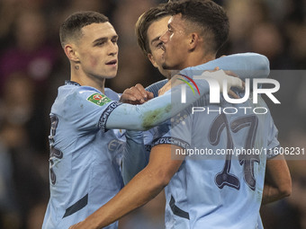 Matheus Nunes #27 of Manchester City F.C. celebrates his goal during the Carabao Cup Third Round match between Manchester City and Watford a...