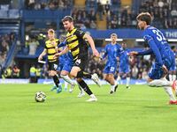 Curtis Stokes (14 Barrow) goes forward during the Carabao Cup Third Round match between Chelsea and Barrow at Stamford Bridge in London, Eng...